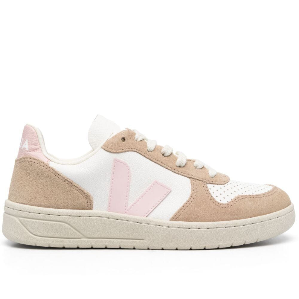Beige and white sneaker with a brand logo on a white background